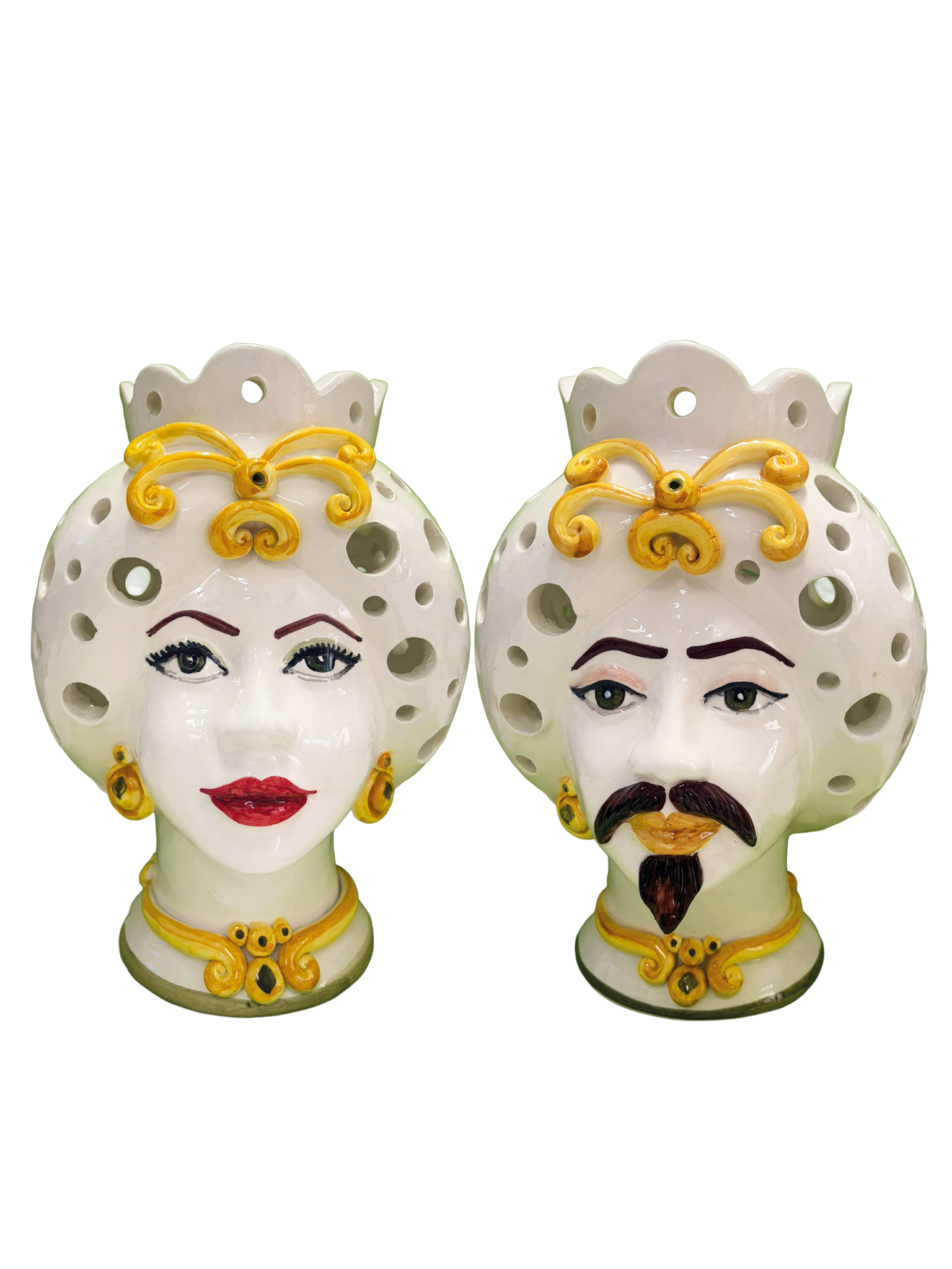 Coppia di lampade da tavolo in maiolica traforata raffiguranti le Teste di Moro in bianco e oro.