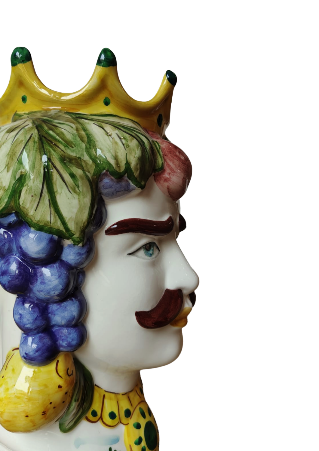 Dettaglio Testa di Moro, maschile, con decorazione a frutta in ceramica siciliana dipinte a mano a Bronte